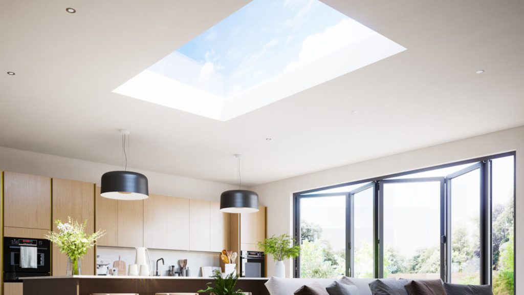 Kitchen with natural light streaming in through a Korniche Flat Glass Rooflight.