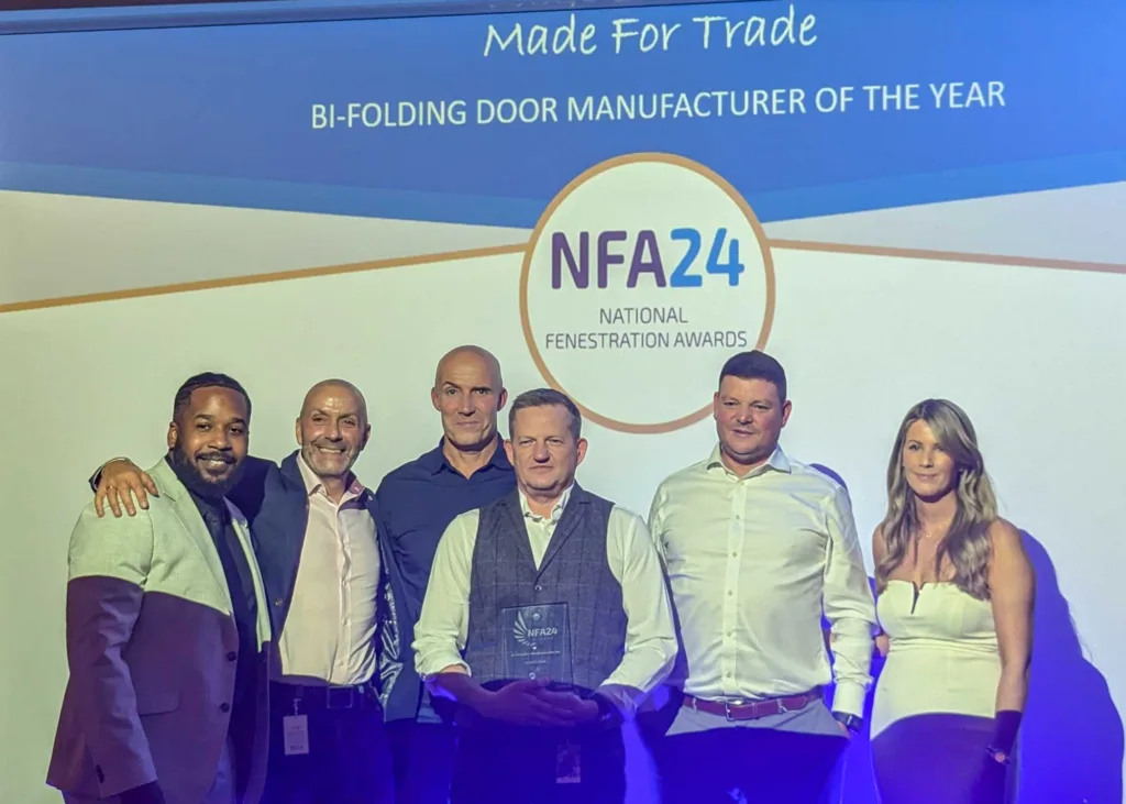 The Team collect the trophy for Bi-folding Door Manufacturer of the Year at the 2024 National Fenestration Awards